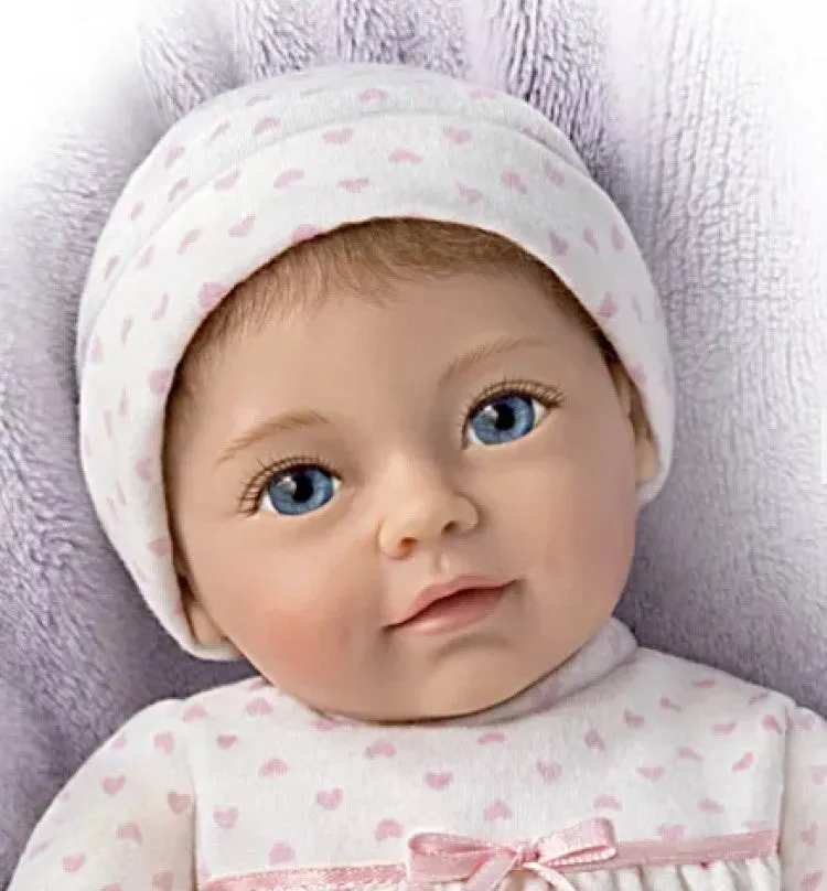 The Ashton-Drake Galleries Little Ellie Tiny Miracles Lifelike Baby Girl Doll Realistic Hand Rooted Hair Fully Poseable with Soft RealTouch® Vinyl Skin and Bean Bag Body Ages 3 and Up 10"-Inches